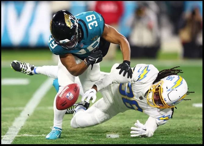 Jaguars quarterback Trevor Lawrence throws four picks in the first half in his postseason debut.
