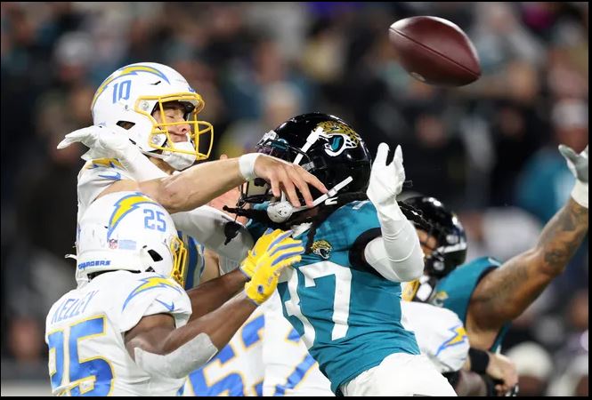 Jaguars quarterback Trevor Lawrence throws four picks